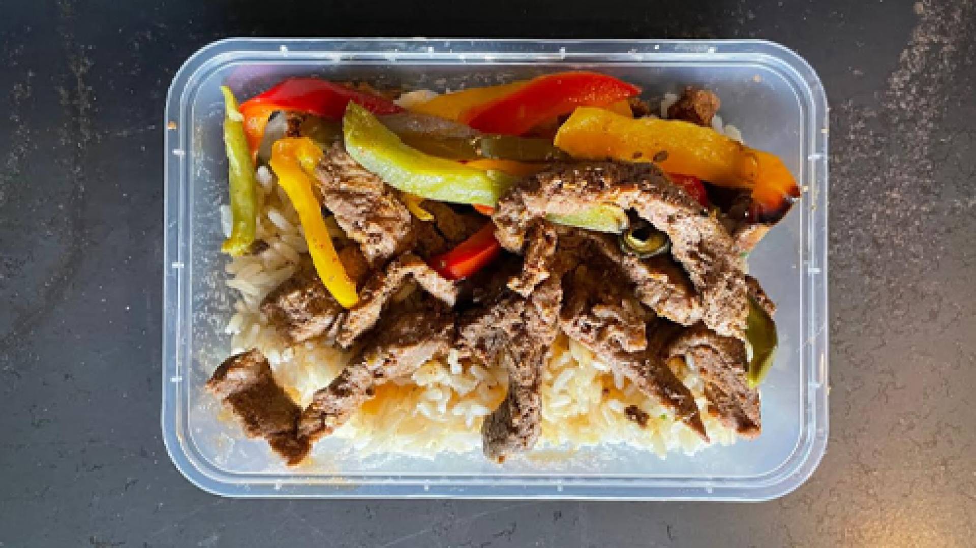 Seasoned Rump Strips, Peppers, Rice & Greens